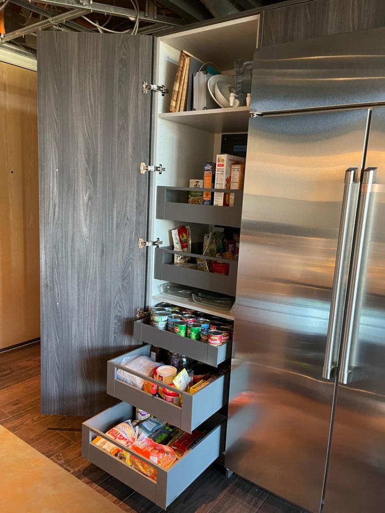 Internal drawers in a frameless pantry cabinet 