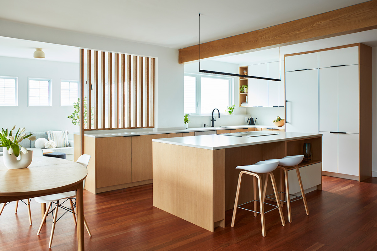 Light Oak Wood Veneer and Acrylic Matte White cabinetry paired together flawlessly